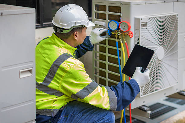 Professional Air Conditioning Repair technician working in Bath, MI